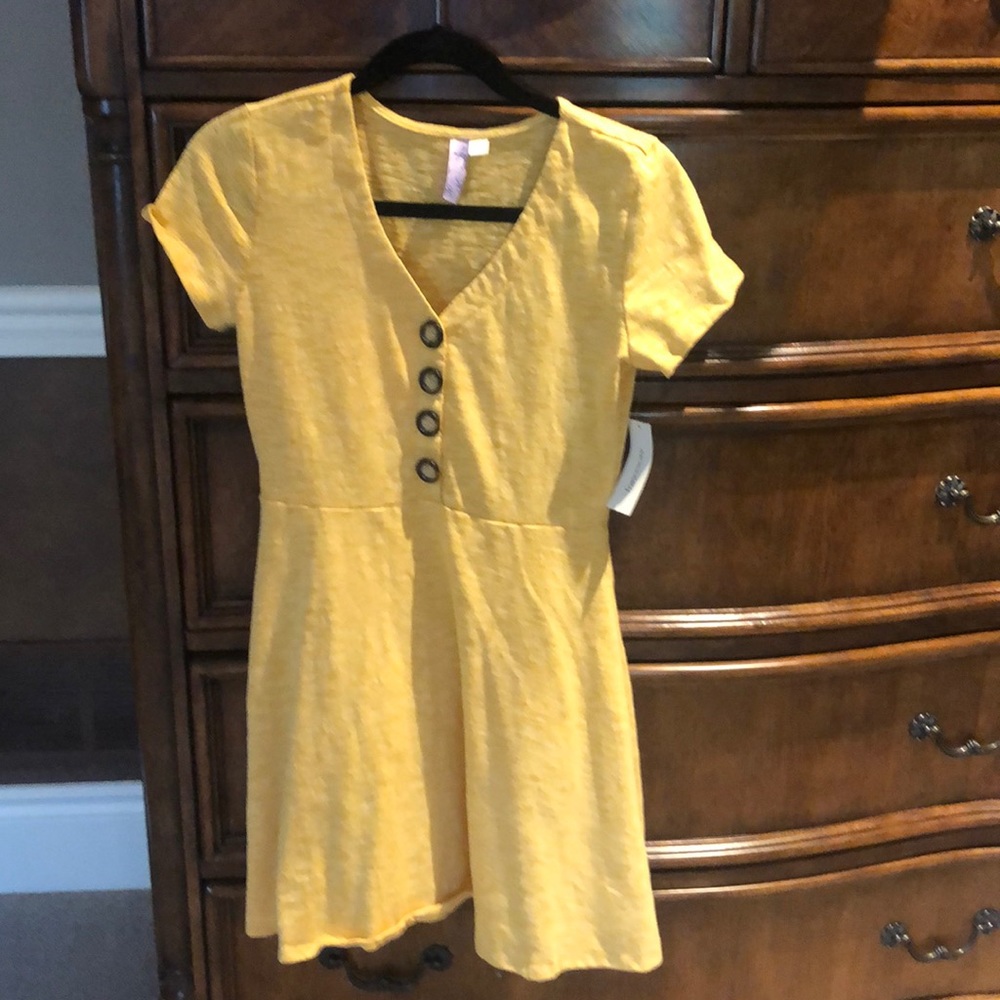 Mustard short sleeve cotton dress from Francesca’s .